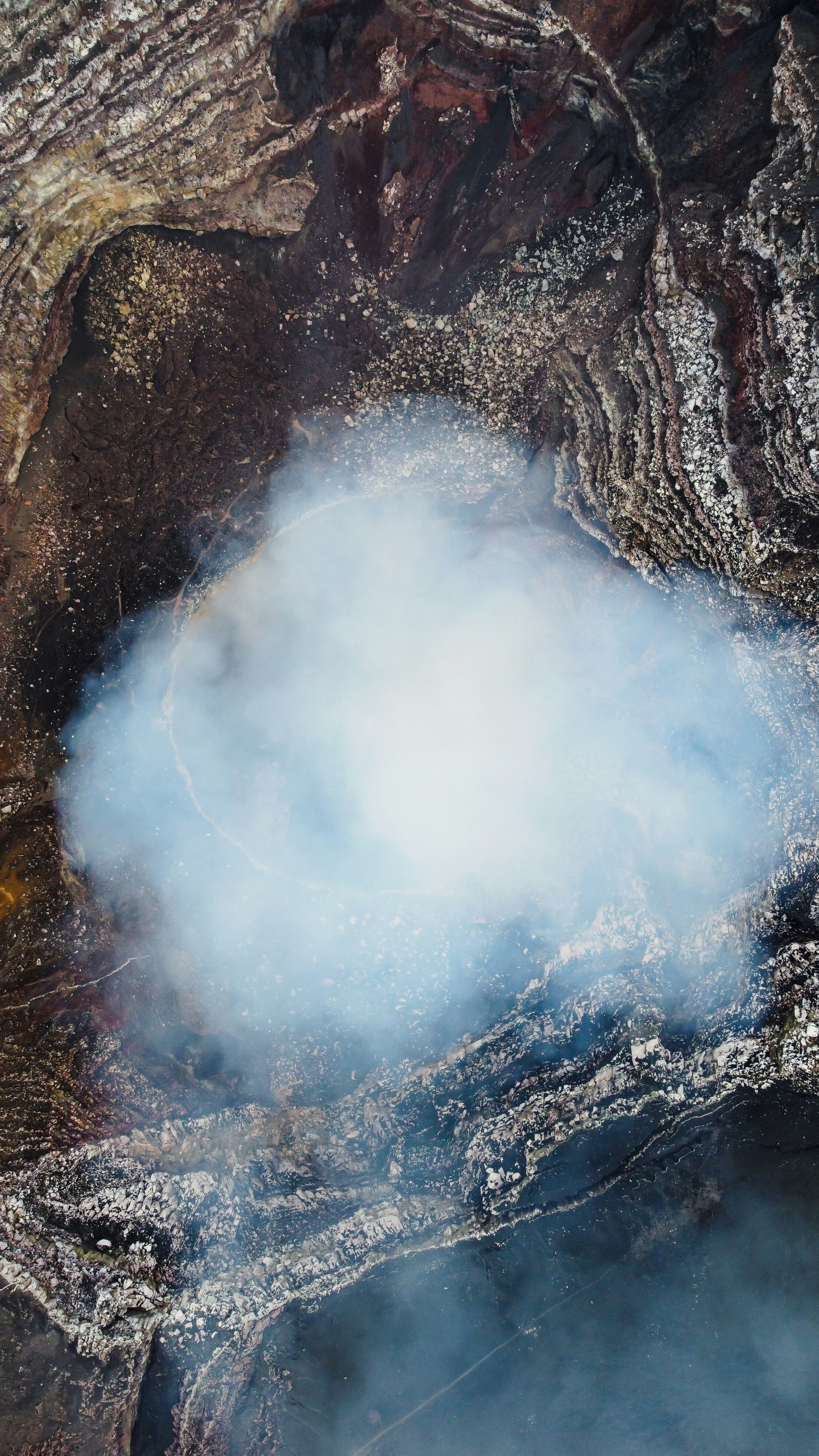 white smoke on brown rock